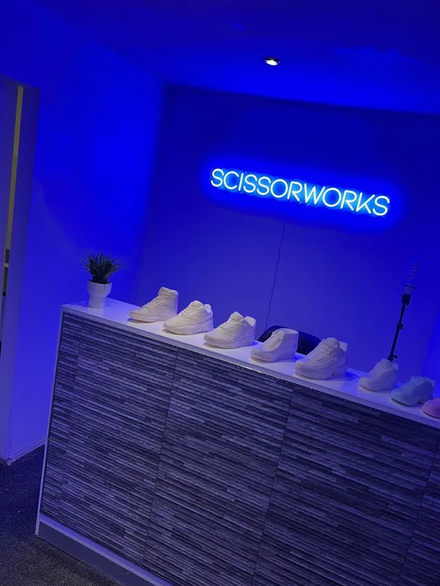 The Scissorworks neon sign